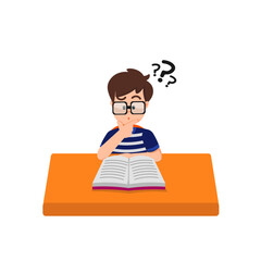 A boy with a glasses reads a book at his desk with a puzzled expression