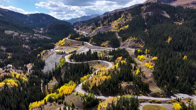 Aerial of Winding Mountain Road Million Dollar Highway Through Colorado Rockies (Fall Foliage)