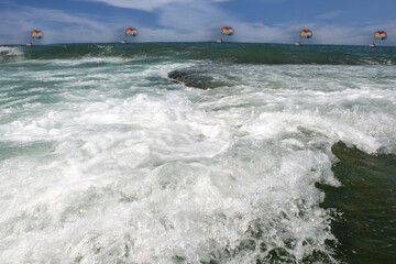 A moving wave on the sea in good weather.