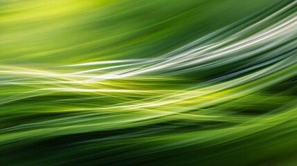 Abstract image features motion blur and vibrant green hues creating a sense of speed.