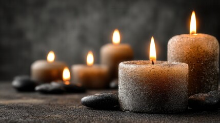 church candles lit on plain background