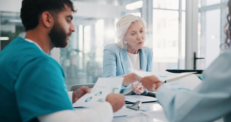 Doctor, documents and people in meeting, discussion and medical planning with information. Charts, healthcare or employees with teamwork, clinic results and problem solving with report analysis
