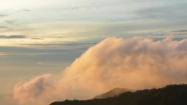 Clouds rolling over genting highlands at sunrise