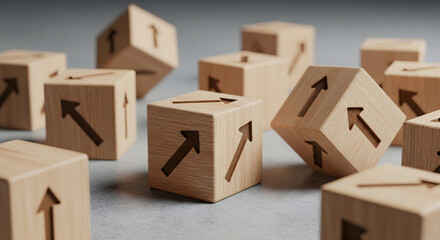 Fototapeta premium Wooden cubes with upward arrows symbolize growth, progress, and business success in a modern setting
