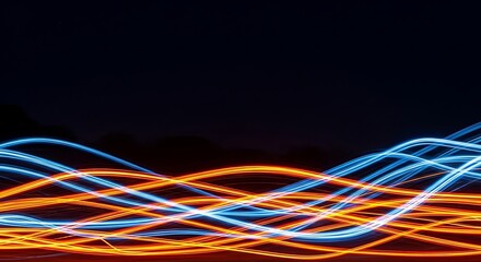 Abstract visualization of data transfer and energy flow, featuring intertwined waves of vibrant blue and orange light on a dark background