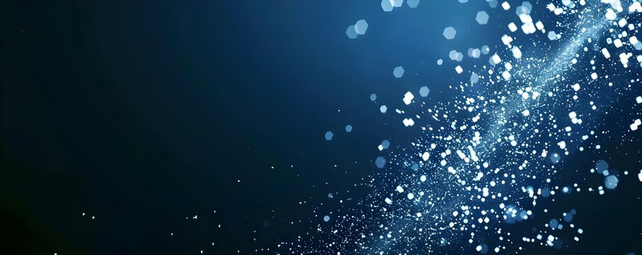 
Digital particles of light and pixelated squares floating on a blue background