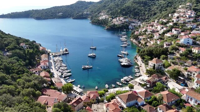 Aerial Drone View of Kioni Village, Ithaca, Greece, Traditional Harbor and Ionian Sea