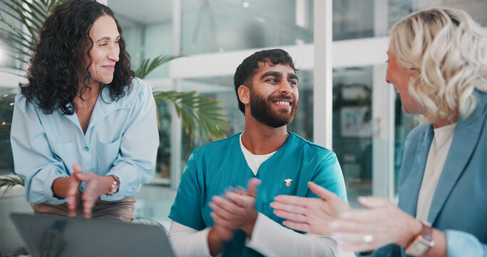 Applause, laptop and medical with hospital administration team in boardroom for celebration. Computer, meeting or success with healthcare staff and manager clapping in clinic for achievement or goals - Powered by Adobe