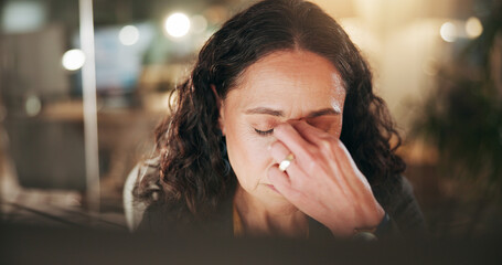 Stress, headache and businesswoman in office at night with burnout or fatigue finance report...