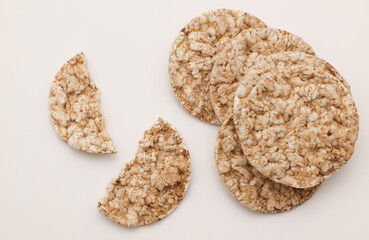 Rice round crackers, diet bread on white background