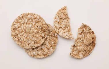 Rice round crackers, diet bread on white background