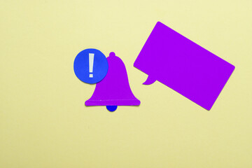 Speech bubble with notification bell icon on yellow background