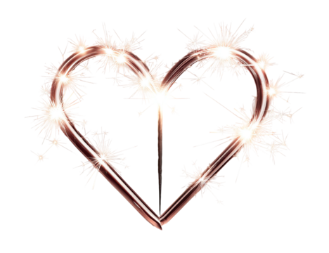 A heart-shaped design, crafted from glowing sparklers, with bursts of light