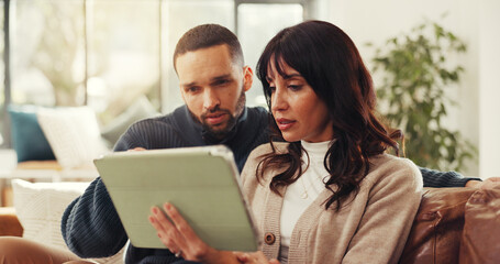 Research, tablet and couple with discussion in home for virtual shopping, buy or decision. Digital...