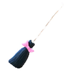 A decorative broomstick with a pink bow, perfect for autumn themes and celebrations.