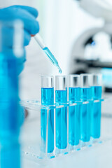 Scientist analyze biochemical samples in advanced scientific laboratory. Medical professional use dropper mix microbiological developmental of viral. Biotechnology research in  science lab. cosmetic