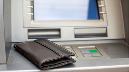 Wallet leather atm screen offline banking finance cash technology security closeup modern digital transaction keypad money withdrawal deposit urban metallic electronic gigapixel