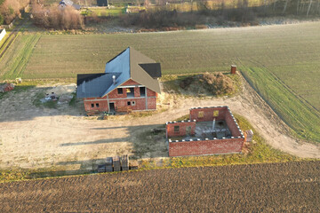 Off grid home construction in rural landscape