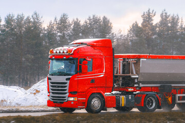 Heavy vehicle transporting goods on highway