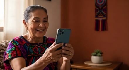 Happy Elderly Woman Using Smartphone at Home