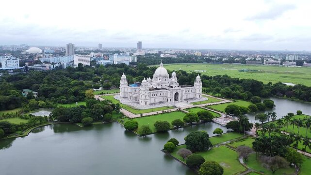 Aerial view of  famous Victoria Memorial. Large marble building on Maidan in Kolkata. Victoria Memorial, Kolkata. Indian city aerial view.