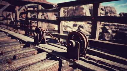 This setting features an antique wooden bridge supported by pulleys and chains.
