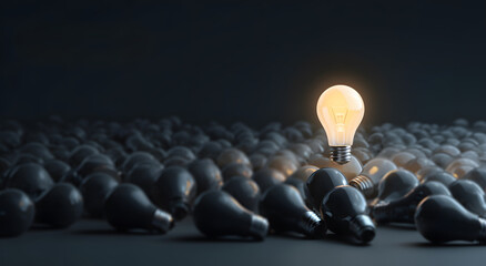 a glowing light bulb shining among dark bulbs symbolizing business creativity and innovation with technology startup vision capturing leadership success imagination and breakthrough ideas