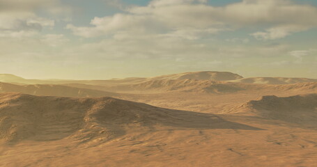 Endless golden dunes and rugged mountains stretch across the horizon under a vast sky. Warm sunlight casts enchanting shadows, highlighting the natural beauty of the desert at sunset.