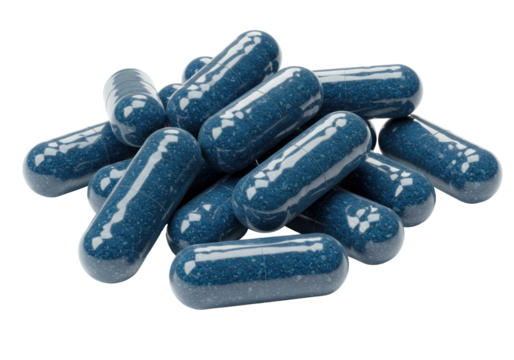 Isolated close-up of prescription blue capsule pills for healthcare or supplement concepts