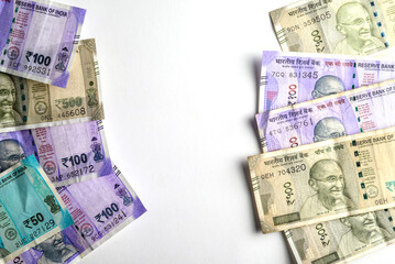 Various Indian Rupee Notes Arranged Against a Clean White Background