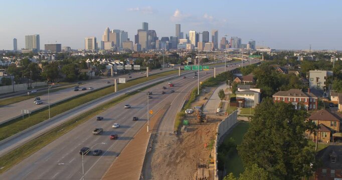 Wide Drone Shot of Houston Highway Interchange and Downtown