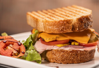 close up picture of classic ham and cheese sandwich