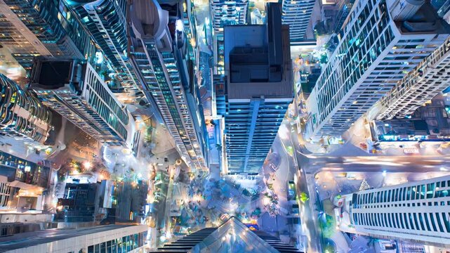 Bird&rsquo;s-eye view of futuristic megacity streets glowing at night, capturing dynamic energy, modern architecture, and the breathtaking complexity of urban life from above.