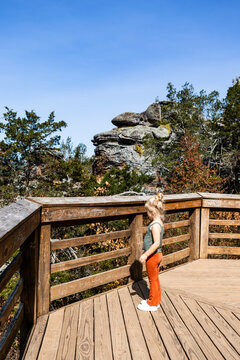 Child on wooden deck at Illinois Garden of the Gods