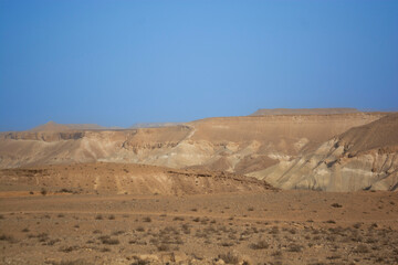 desert landscape against the blue sky