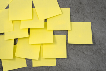 Multiple sheets sticky notes on the wall