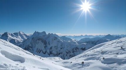 Majestic panoramic view of a snow-covered mountain range under a brilliant sun and clear blue sky, a perfect alpine winter landscape