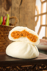 Handmade Chinese Steamed Buns with Sichuan Meat Filling and Soy Sauce Base