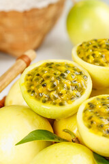 Fresh Hainan Passion Fruit Halves with Golden Honey Pulp and Seeds - Premium Tropical Fruit Picking Concept