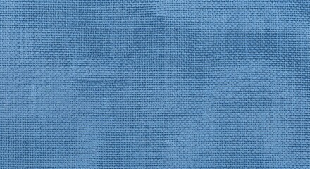 A close-up view of a solid, smooth, light-blue textile with a discernible woven texture.