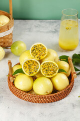Fresh Golden Passion Fruits in Wicker Basket with Juice Glass - Tropical Hainan Egg Fruit Picking Display