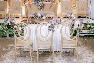 Elegant Outdoor Wedding Seating and Table Decor