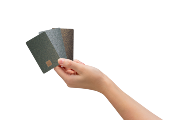 Hand holding three bank cards, cashless payment isolated on white.