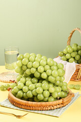 Fresh Green Grapes in Wicker Baskets with Crystal Glass - Healthy Organic Fruit Display