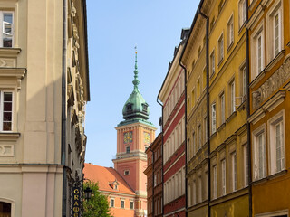 Warsaw Old Town UNESCO heritage site with a view of the Royal Castle tower and colorful historic