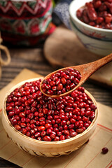 Fresh Red Adzuki Beans from Guizhou China in Traditional Woven Basket with Wooden Spoon