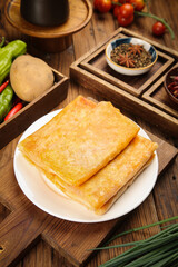 Handmade Golden Potato Pancakes with Fresh Ingredients on Rustic Wooden Table - Traditional Breakfast Food