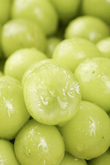Fresh Green Guizhou Grapes with Water Droplets Revealing Interior Detail - Seasonal Fruit Close-up