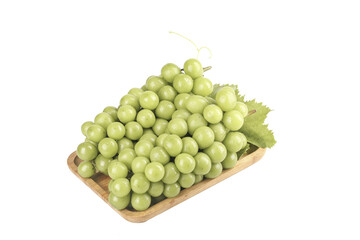 Fresh Green Grapes with Leaves on Wooden Tray Isolated on White Background