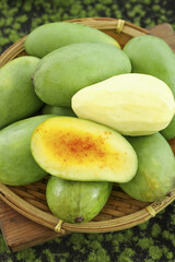 Fresh Hainan Ivory Mangoes in Bamboo Basket - Natural Tropical Fruit Collection
